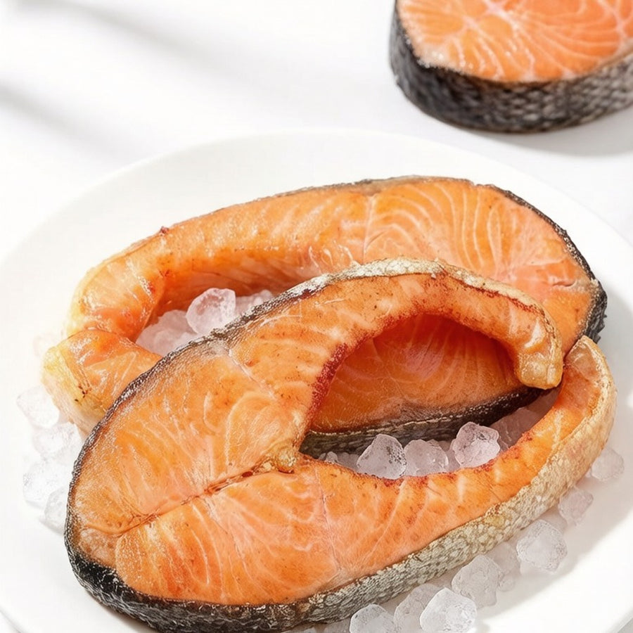 Raw salmon cross-cut portions resting on crushed ice